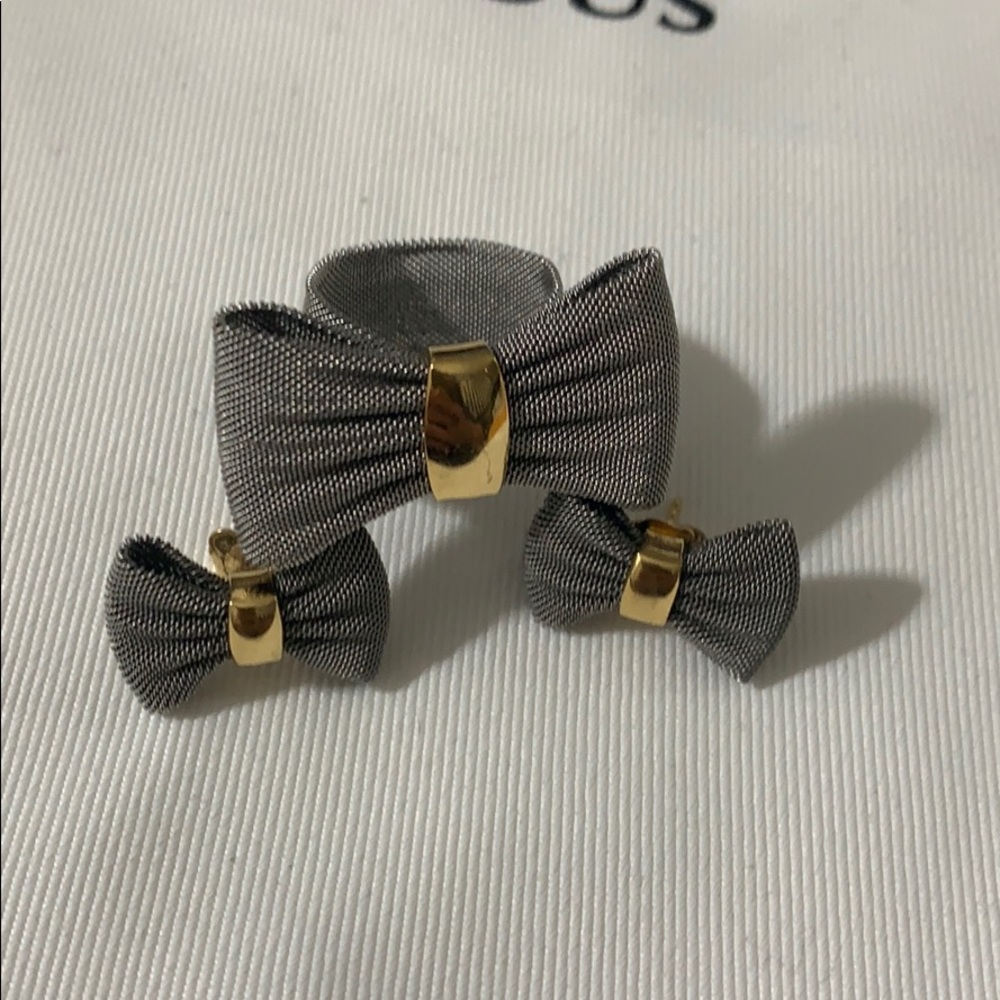 Set of Ring and earrings of steel with gold (750).